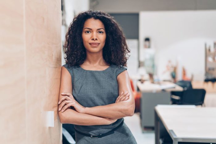 businesswoman looking at the camera with arms crossed